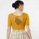 Stay On Trend: Latest Fashion Readymade Blouses for Women,round neckline,elbow sleeves with back details with an added hand dyed patch applique stitched on the net .40005 FINESTFIT