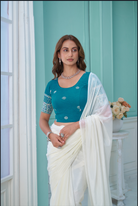 Stay On Trend: Latest Fashion Readymade Blouses for Women,round neckline,embroidered border detail on elbow sleeves.34057