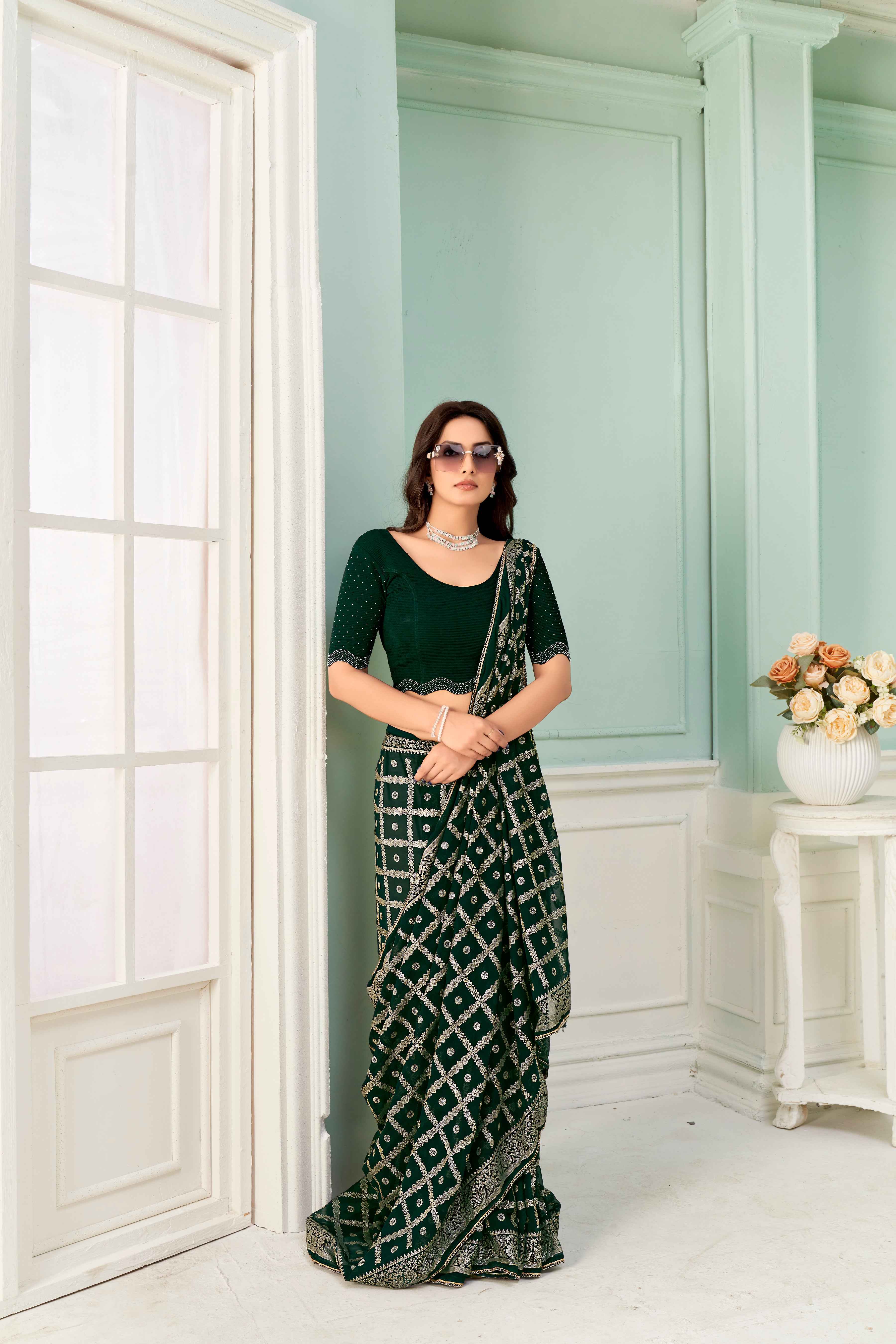 Stay On Trend: Latest Fashion Readymade Blouses for Women,round neckline with lasercut style hems and swarovski embellished beautifully.16111