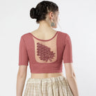 Stay On Trend: Latest Fashion Readymade Blouses for Women,round neckline,elbow sleeves with back details with an added hand dyed patch applique stitched on the net .40005 FINESTFIT